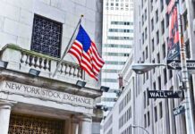 Trump’s $750 Million Stock Surprise Facade of the New York Stock Exchange with an American flag and Wall Street sign