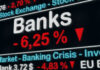Trump Cheers Inflation Amid Iran War Stock exchange displays bank crisis percentage decrease.