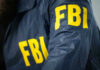 Pennsylvania Teen Identified in Cold Case Murder FBI jacket with yellow letters.