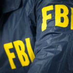 Pennsylvania Teen Identified in Cold Case Murder FBI jacket with yellow letters.