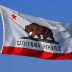 California Governor Race Tightens California state flag featuring a bear and a red star against a blue sky