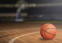 Political Stunt Masks NYC’s Real Mess A basketball resting on a wooden court