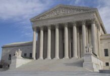 Vice President Takes on “The View” Co-Hosts The Supreme Court building featuring large columns and statues