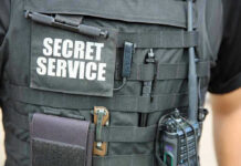 Missed Warnings, Missed Calls—Then the Shots Rang Out Secret Service vest with various tactical gear attached.