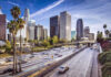 Freeway Sunroof Incident Puts Britney Spears Back in Spotlight Downtown cityscape with skyscrapers and highway traffic.