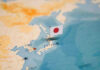 Super Typhoon Bavi Unleashes Heavy Rain Map of Japan with flag pin placed nearby