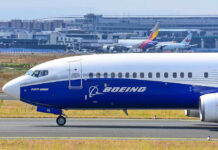 A Cargo Jet Went Silent Over the Arabian Sea Boeing 737-800 on airport runway with other planes.