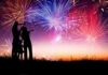 Wild Tribute: Japan Marks America 250 With Fireworks Silhouetted figures watching a colorful fireworks display against a twilight sky