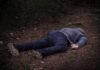 The Headlines Moved Faster Than the Evidence person lying face down on a forest path
