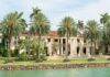 Florida’s Biggest Tax Cut Proposal Loses Its Biggest Political Champion A luxurious mansion surrounded by palm trees and a waterfront view