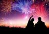 Record-Breaking Fireworks Cap America’s 250th Birthday Silhouetted figures enjoying a fireworks display against a colorful night sky
