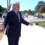 Trump shows reporters a new granite helipad at the White House