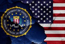 FBI Insider Allegedly Stole Nearly $1M in Crypto FBI seal and American flag on cracked wall