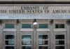 Embassy Art Purge: State Department Targets Artwork United States embassy entrance with metal doors and security camera