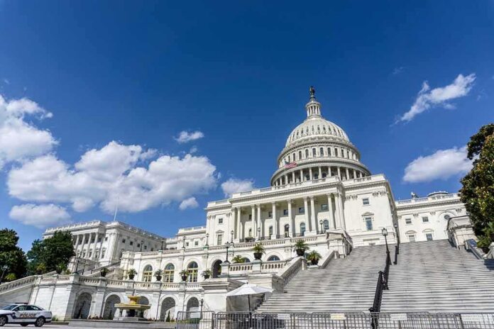 shutterstock_1926570719 United States Capitol building under a bright blue sky