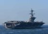 Trump Bets on Peace Instead of More Bombs Aircraft carrier cruising at sea