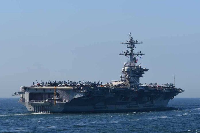 shutterstock_2153816283 Aircraft carrier cruising at sea