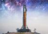 Early Launch Shock: Falcon Heavy Jumps Schedule Rocket on launch pad under starry sky