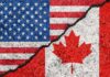 U.S.-Canada Antitrust Cooperation Put on Hold USA and Canada flags with a cracked border