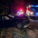 16-Month-Old Critically Injured In Four-Car I-15 Crash Crashed car on a dark roadside with emergency vehicles