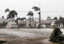 Category 5 Monster Stalks Mexico Houses battered by hurricane winds and flooding