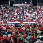 Trump Takes Over Both Nights of GOP Convention Walter Jones among crowd at a political rally in an indoor arena