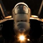 fighter jet front view with cockpit and headlight illuminated