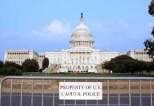 Abolish ICE? DHS On the Chopping Block View of the U.S. Capitol building with a security barrier in front