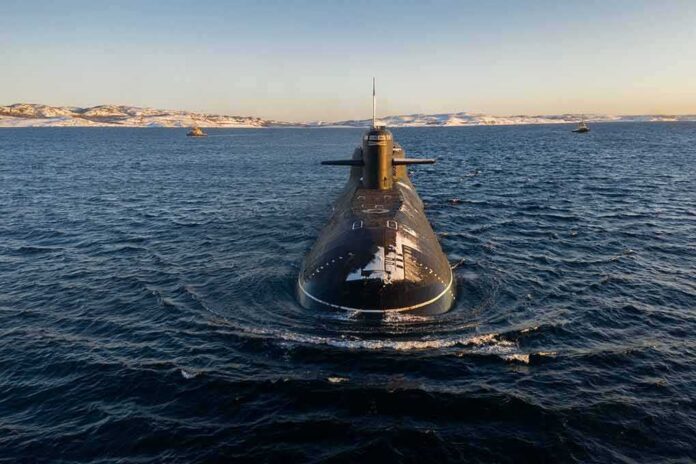 shutterstock_2008005947 Submarine cruising on cold open water toward camera