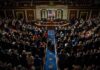 44 Members of Congress Named in Records Dispute Legislative chamber audience stands and applauds