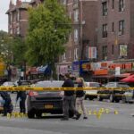 Stadium Gunfire: 7 Arrests After Shooting Police investigate a taped-off urban street crime scene