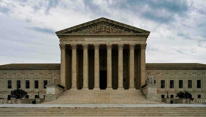 shutterstock_2304961451 Supreme Court building with grand columns and steps