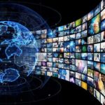 Comedian Arrested in $8.7M Tax Fraud Case Digital globe with curved wall of multimedia screens