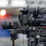 Announcer Fired After Off-Duty Allegations Professional video cameras on tripods