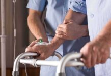 America’s Care System Faces a Major Shake-Up Elderly person using a walker with caregiver support