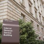 Judge Orders NYC to Redo Second-Home Tax Roll Internal Revenue Service Building sign outside a classical stone office building