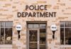 St. Paul Mayor Faces Lawsuit From Police Chief Police department building entrance with signage