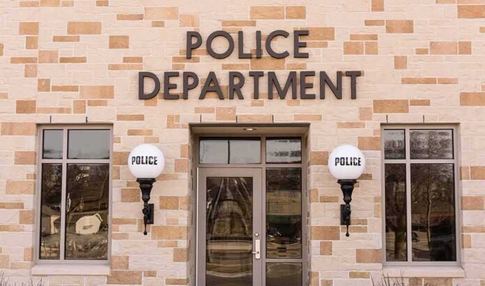 Police department building entrance with signage