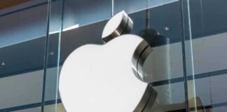Apple logo on a glass storefront