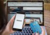 Person shopping on Amazon with phone and credit card