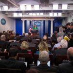 U.S. Unveils New CJNG Indictments, $100M Rewards Press secretary at podium addressing reporters in briefing room