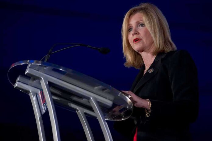 Marsha Blackburn speaking at a podium with a microphone