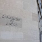 Federal Investigation Puts Election Timing Under Scrutiny Department of Justice building exterior with American flags
