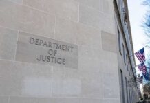 Federal Investigation Puts Election Timing Under Scrutiny Department of Justice building exterior with American flags