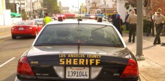 Sheriff patrol car parked on city street