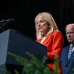 Trump Fills Two-Month Press Secretary Vacancy Jill Biden speaks at a podium as Joe Biden stands behind her