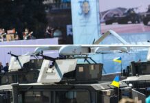Russian Military Supply Chain Hit Military drone mounted on armored vehicle
