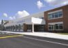 Judge Finds Possible First Amendment Violations Modern school building with large windows and a clear sky
