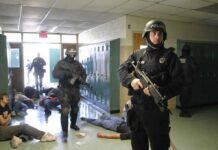 Parent Stops Oregon School Shooting Police officers responding to a school emergency with students on the floor