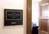 Iran War Sparks New Ethics Debate in Maine Office door sign in a hallway